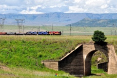 Volksrust Consist  Clear skies after a light shower a Spoornet 3 Loco consist stops momentarily along the N11 from Volksrust to Newcastle, Kwa-Zulu Natal, South Africa. | Sigma 100-300mm f/4 EX DG APO HSM : diesel, locomotive, consist, volksrust, newcastle, n11, mpumalanga, majuba, spoornet